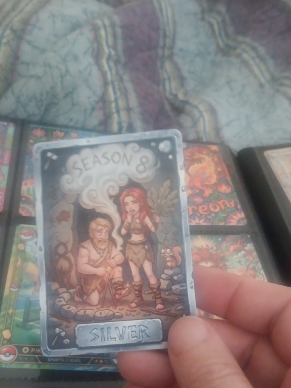 Season 8 Silver Trading Card – Blue and Brown Artwork